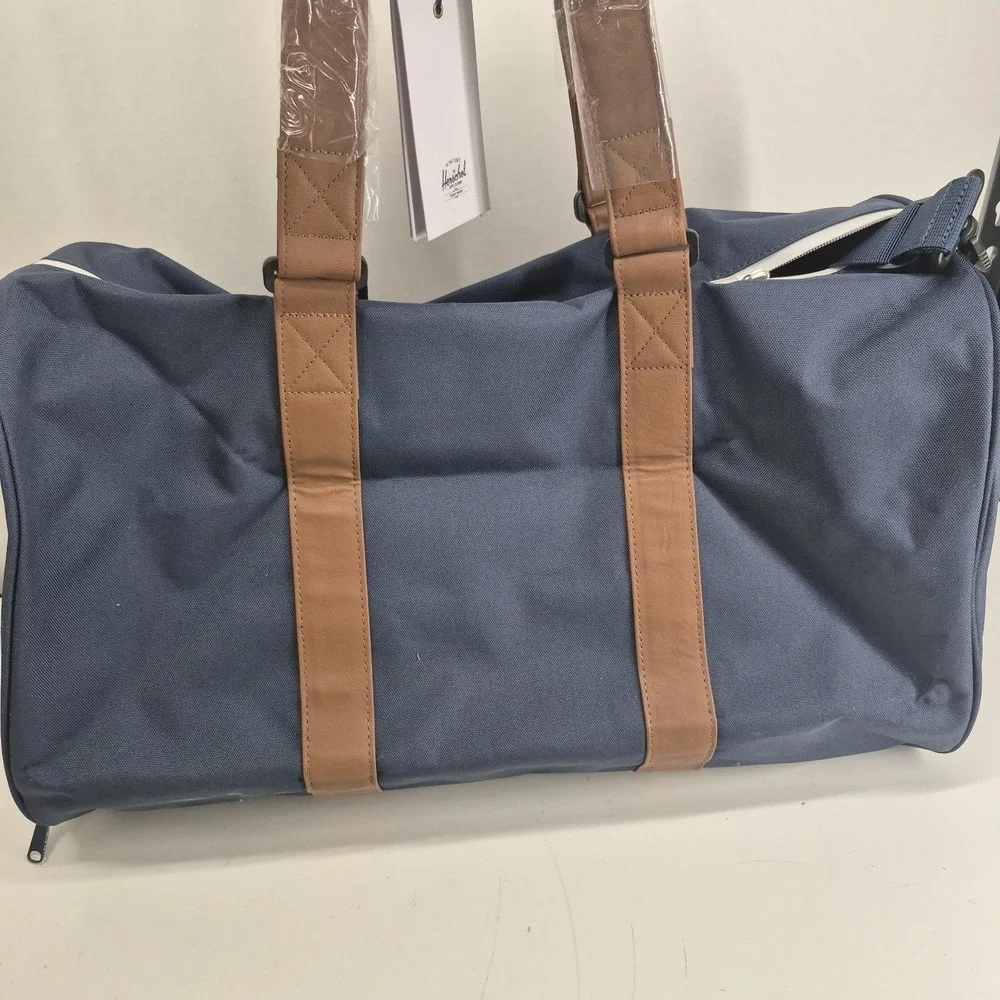 Herschel Novel Duffle Bag Navy Tan Retail: $120